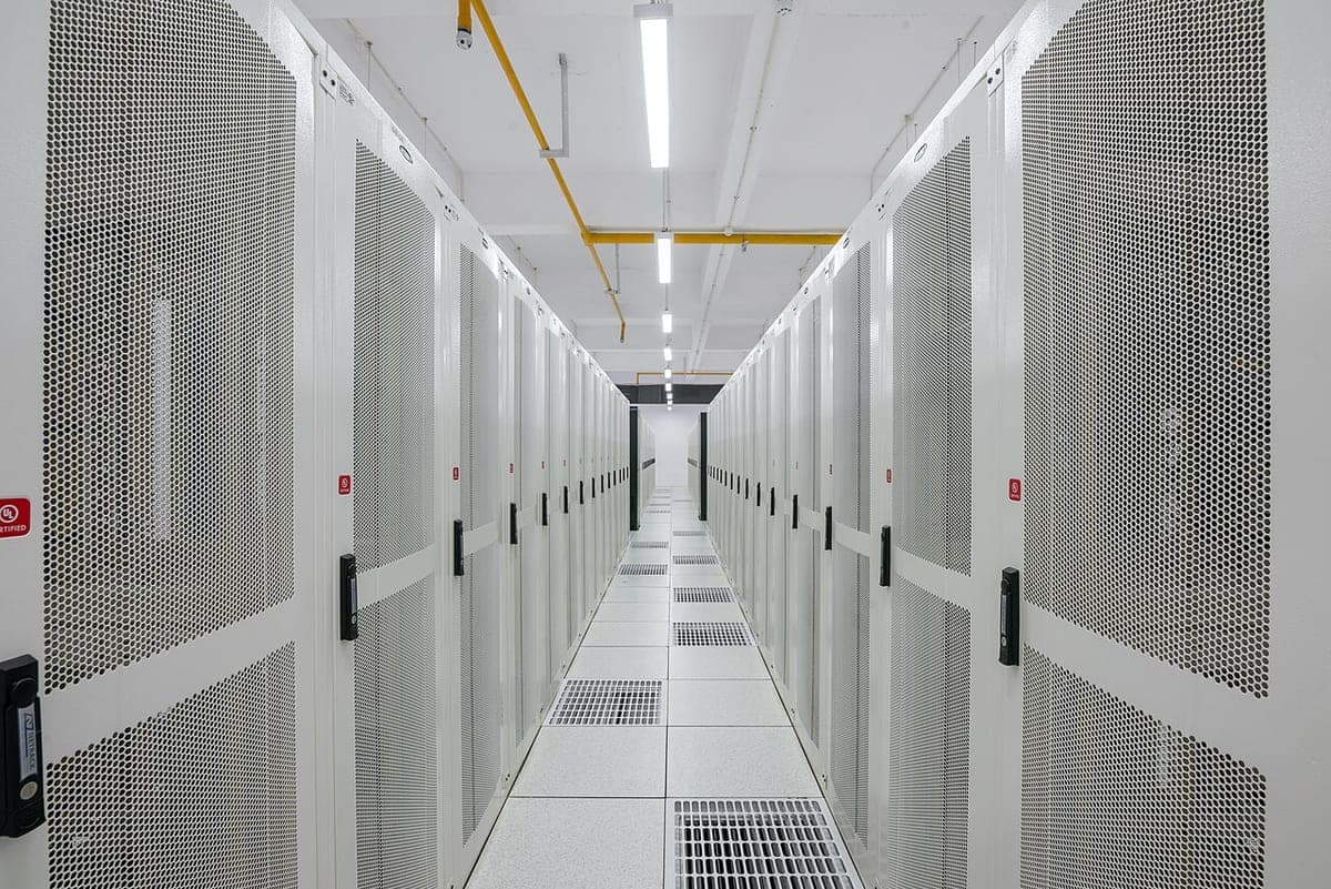 Rows of server racks inside a data centre